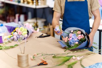 Florist working in flower shop