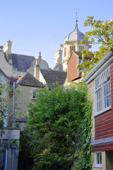 Traditional houses with the bell tower of St Thomas More's Catholic Church in the background, Bradford on Avon, UK