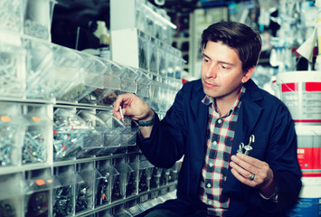 Portrait of adult man in hardware shop
