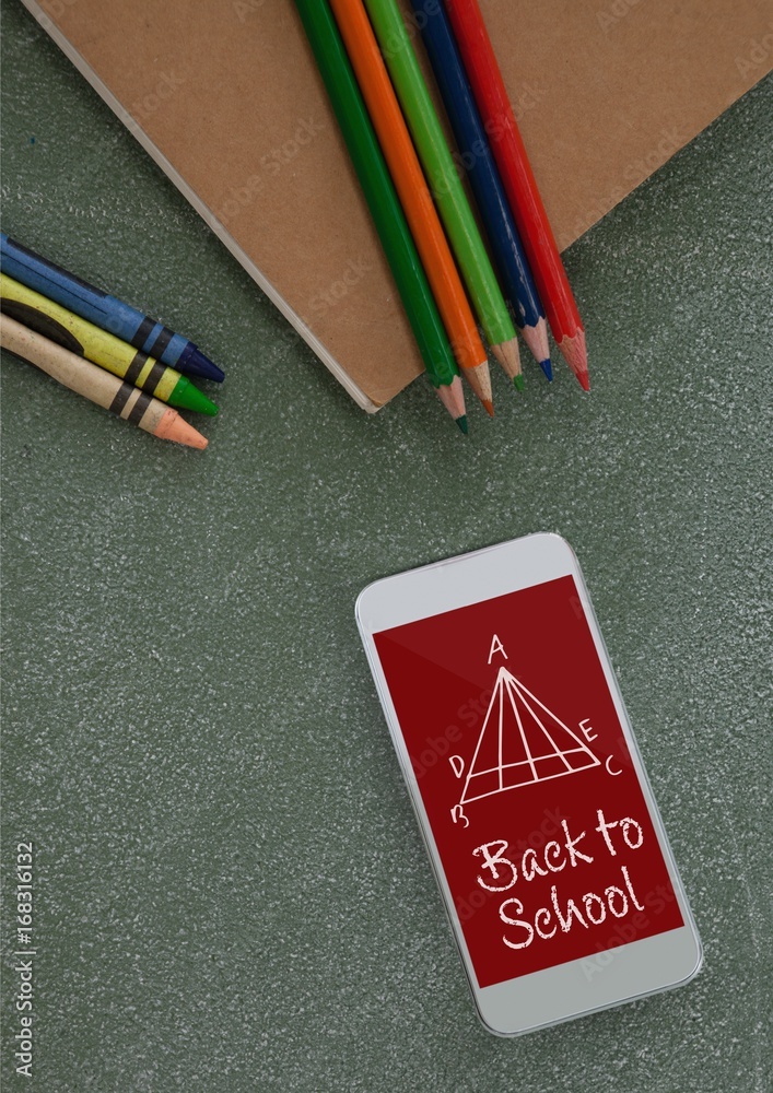 Sticker Phone on a school table with school icons on screen