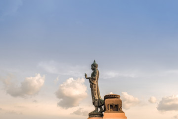 Fototapeta premium Big Buddha statue on cloud sky