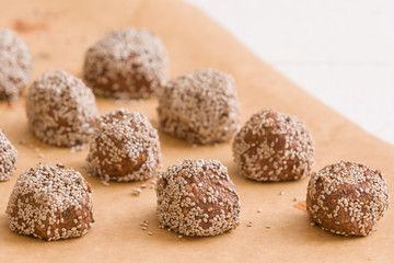 Dark chocolate coconut brownie energy bites.Oatmeal balls / Oats dates energy balls. Vegan sweet delicious nut cocoa balls. Healthy and tasty food concept