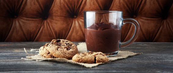 hot chocolate with cocoa and chocolate chip cookies.