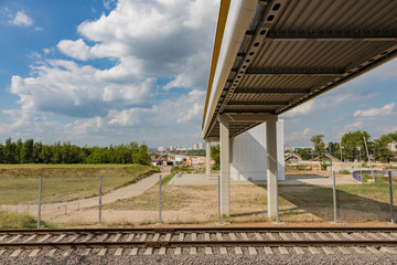 Part of the railroad track at the train station. Rails, sleepers, pebbles
