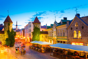 Tallinn, Estonia. People Walking Near Famous Landmark Viru Gate 