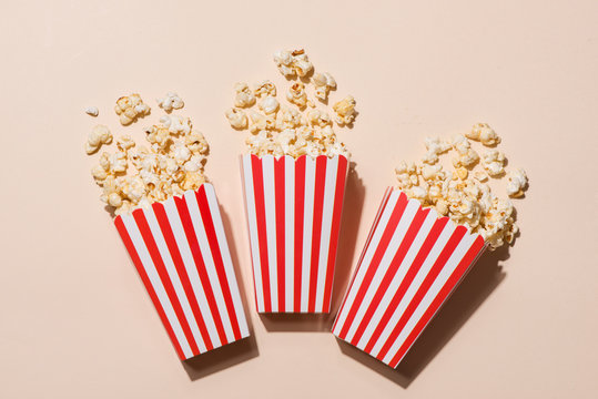 Popcorn in red and white cardboard. Top view