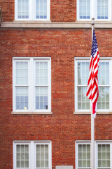 US School Building with Flag