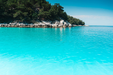 Fototapeta premium Marble beach, Island of Thassos, Greece. Beautiful Turquoise color of the sea on the most famous beach on the Island of Thassos.
