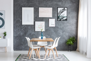 Dark dining room with gallery
