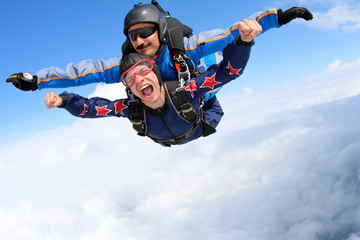 Skydiving. Tandem jump. Happy Passenger.