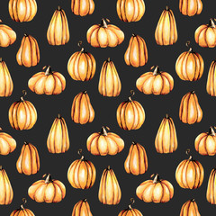 Seamless pattern with watercolor pumpkins, hand painted isolated on a dark background
