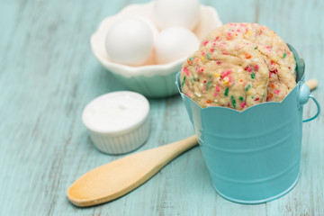 Colorful Confetti Cookies In Blue Tin Bucket With Eggs