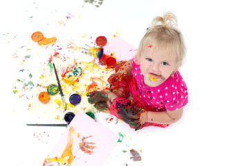 Obraz na płótnie Canvas Creative baby girl with finger paints. Messy play for infants and toddlers. 