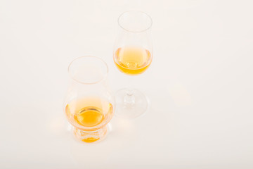 Colorful cocktail decorated with fruit, colorful umbrella, ice cubes, party night