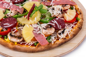 Close up of uncooked Hawaiian Pineapple Pizza