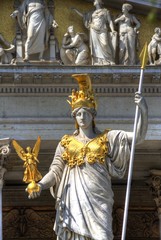 Statute of a Woman with Gold