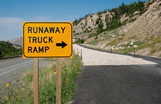 Runaway Truck Ramp Sign:  Truck drivers with failing brakes are offered an emergency escape route along a highway in the mountains of northeast Wyoming.