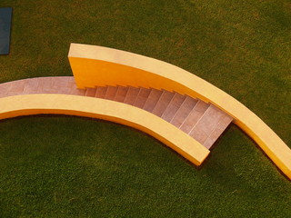 Green and yellow curved stairway 