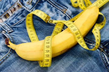 Mens denim pants with banana as male sexuality concept