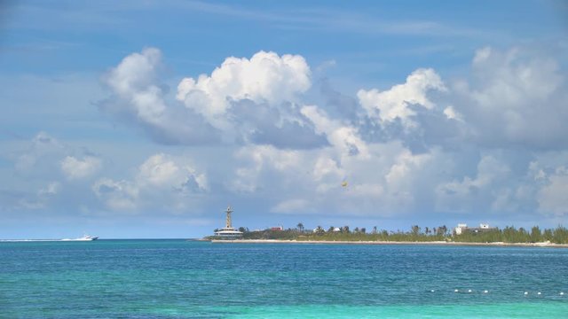 Tropical Ocean Scene at Crystal Cay Marine Park in Nassau Bahamas Wide Shot with Vibrant Exotic Colors as Boats approach Crystal and Arawak Cays on a Sunny Day