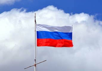 Flag of Russian Federation on the sky background 