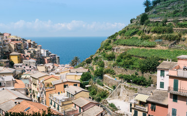 Beautiful colorful cityscape on the mountains over Mediterranean sea, Europe, Cinque Terre, traditional Italian architecture
