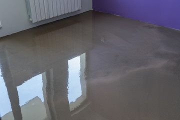 Interior of apartment under construction. Floor covering with se