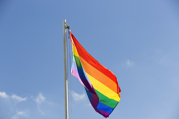 Rainbow flag on a flagpole