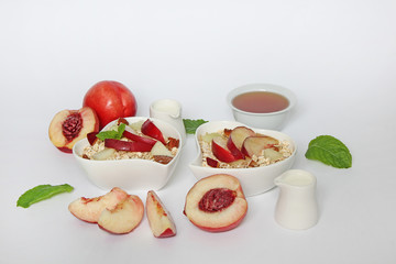 Oatmeal porridge with peaches and honey 