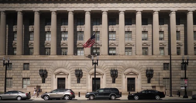 WASHINGTON, D.C. - Circa August, 2017 - A daytime front establishing shot of the Department of Commerce Building in DC.	 	