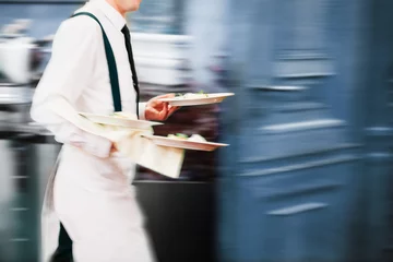 Foto op Plexiglas Waiter Serving In Motion On Duty in Restaurant Long Exposure © Marko Novkov