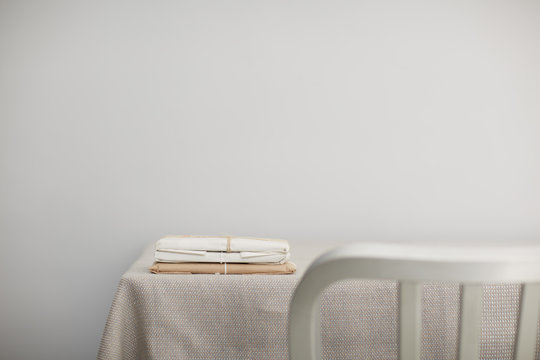 Small stack of wrapped packages on a tablecorner