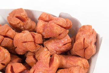 Deep fried chicken sausage slice on white background