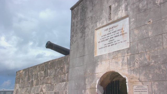 Nassau Bahamas Fort Montagu Close-up of the Historical British Limestone Structure featuring a Cannon and Information Plaque