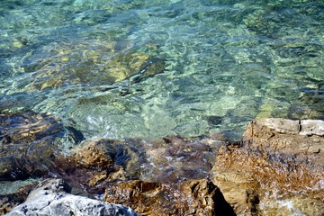 Rocks, green sea, abstract natural background