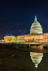 The United States Capitol Building at night in Washington, DC