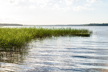 colorful clouds over the summer lake