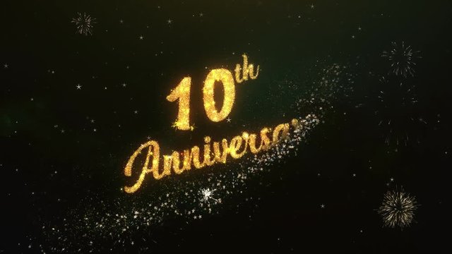 10th Anniversary Greeting Text Made from Sparklers Light Dark Night Sky With Colorfull Firework.

