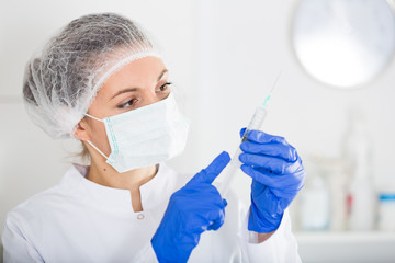 Nurse making injection