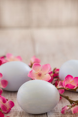 Pastel blue Easter eggs with Cherry blossom flowers