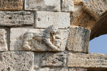 Fototapeta na wymiar Lion Statue over Gate of Hierapolis Ancient City, Turkey