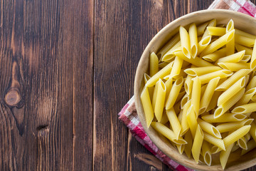 Pasta plate wooden background
