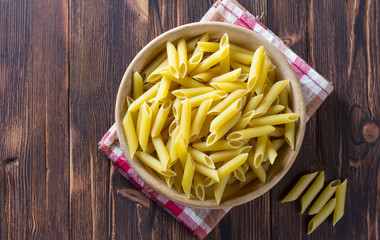 Pasta plate wooden background