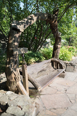 Wood Crafted Swing Bench in the Forest