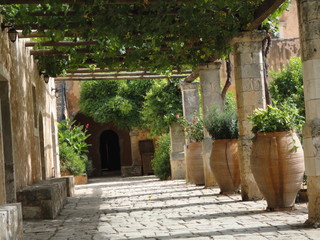 Paved patio with vines, in a monastery