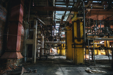 Fototapeta na wymiar Metal Fuel and Power Generation Rusty Equipment, Pipe - Tube in Abandoned Factory