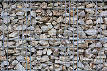 Moderner Metall-Stein-Zaun als Hintergrund