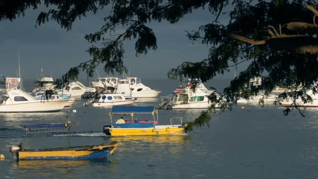 Boats at sea shore port on summer vacation day
