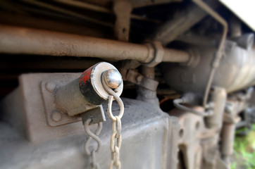Tank cap oil train Old, Old train wheel on a track
