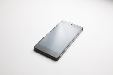 close-up of a mobile phone on a white background